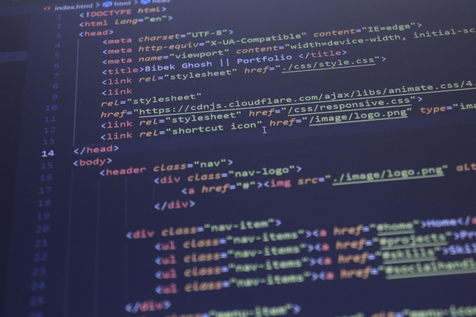 Close-up of HTML code displayed on a computer monitor