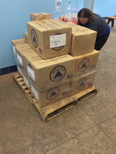 Palletized boxes of custom branded apparel